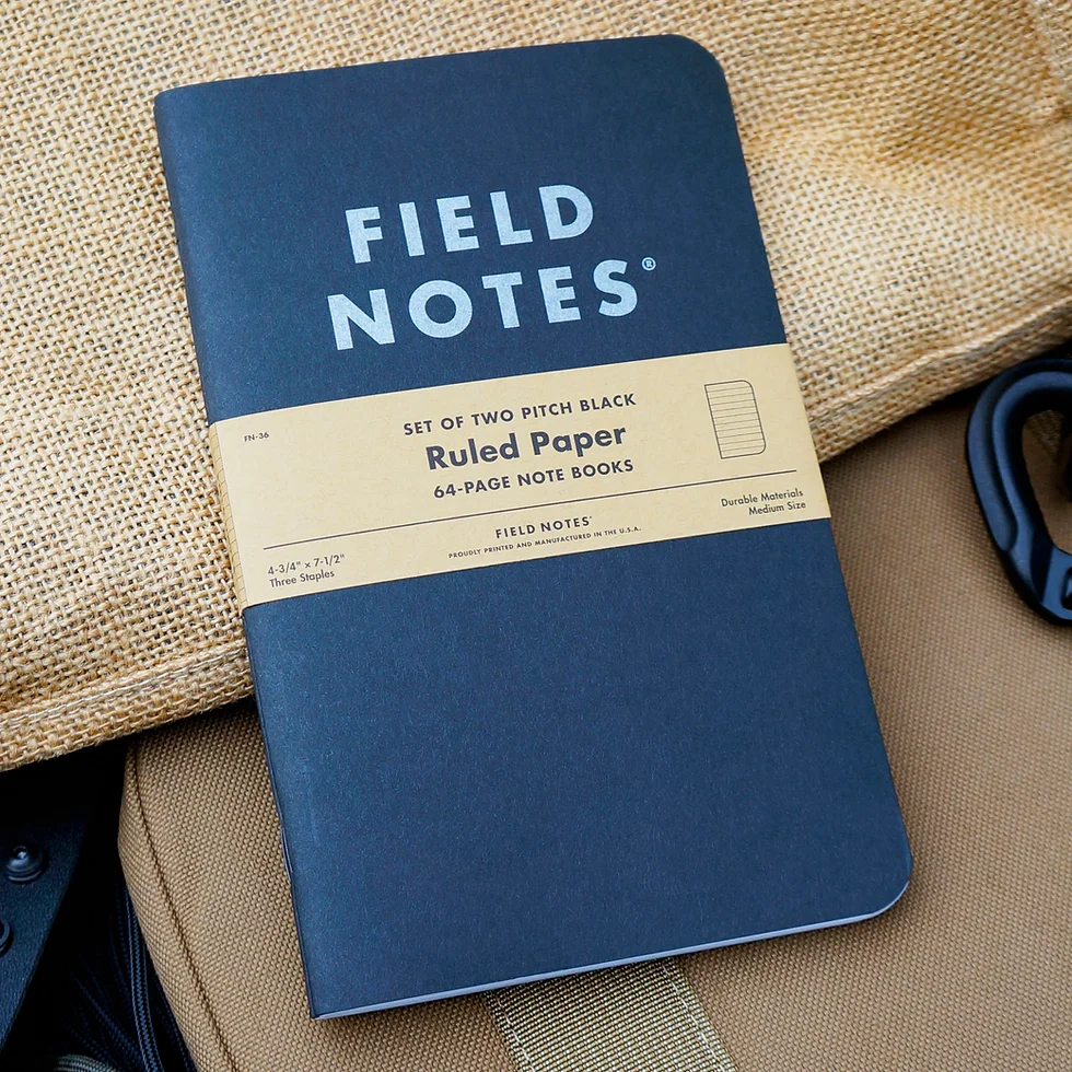 A black Field Notes notebook